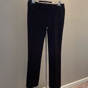 Dark brown bootcut pants from Zara.